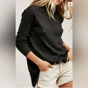 Women’s We the Free split black oversized turtleneck. Size xs